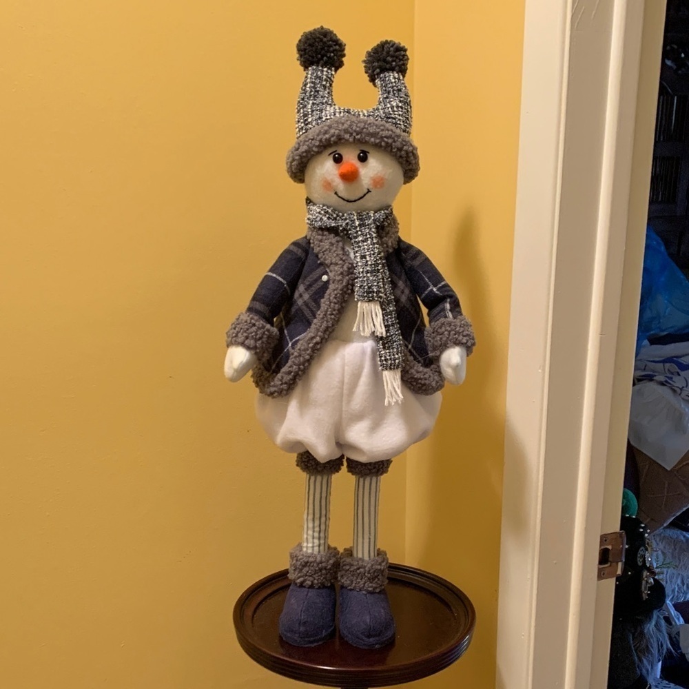 Charming Snowman Holiday Decor with Blue and Gray Outfit